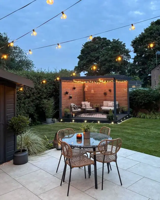 Enchanting Pergola Dining Under Twinkling Lights