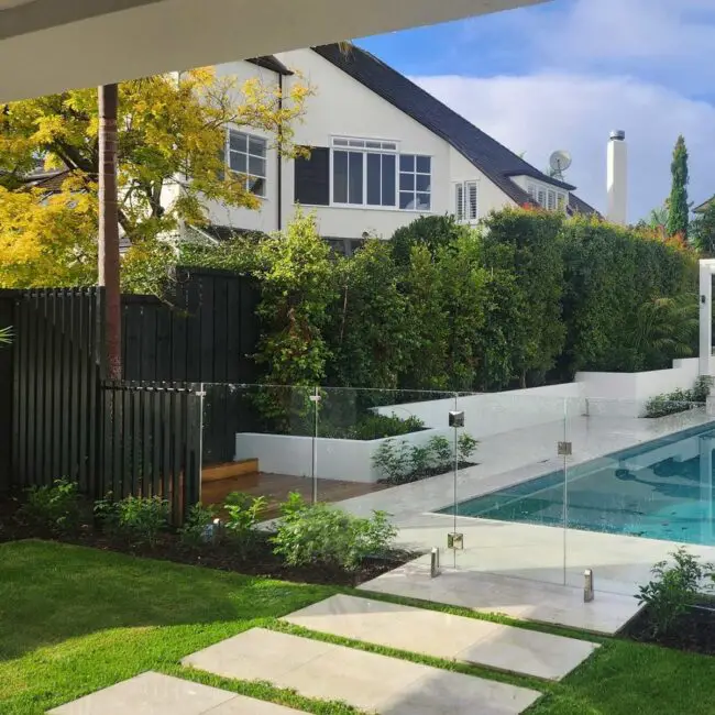 Striking Black Fence with Glass Highlights