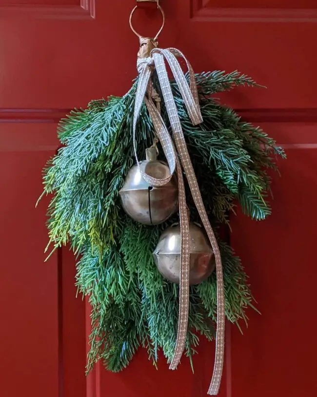 A Classic Door Swag with Pinecones