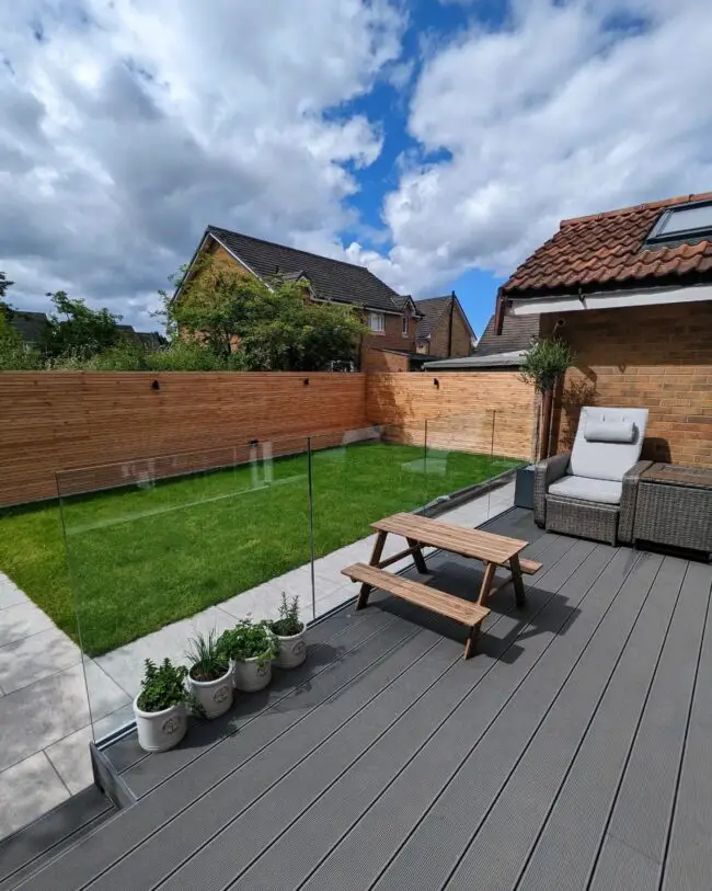 Chic Wooden Fence Featuring Glass Details