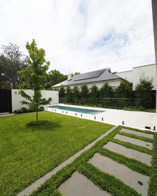 Modern Landscape Featuring Inviting Poolside