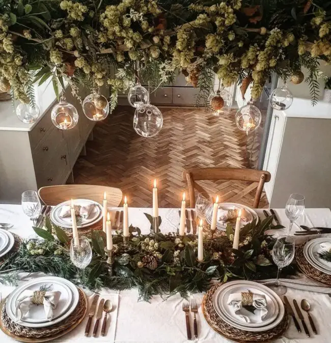 A Dining Room Table with Hanging Greenery