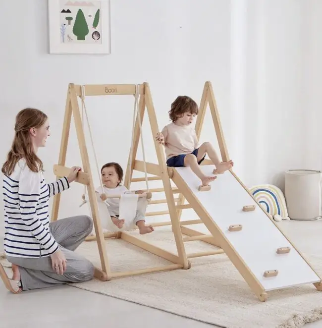 Versatile Playroom Featuring Swing and Art