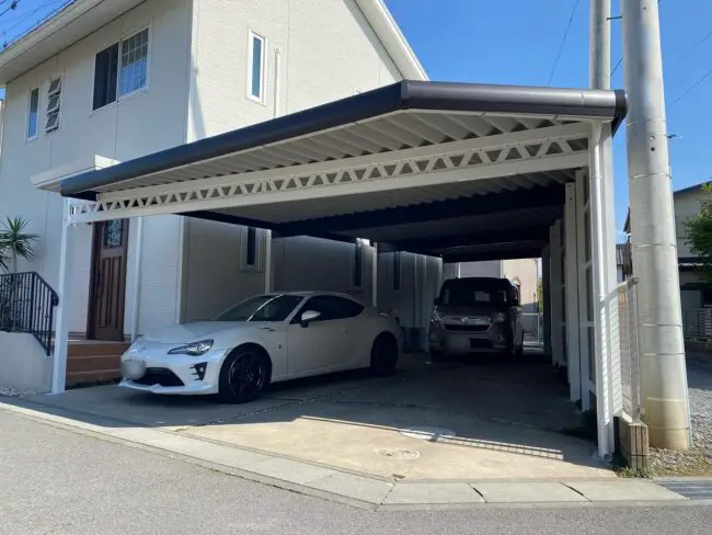 Dual Carport Supported By Exposed Structural Beams