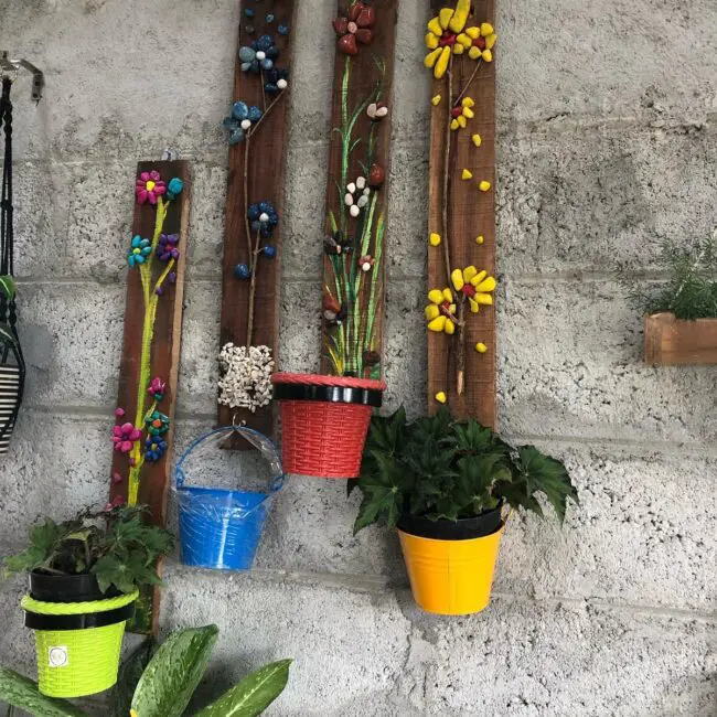 Lively Vertical Garden Featuring Pebble Designs