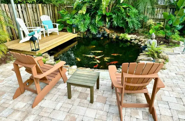 Cozy Backyard Pond with Integrated Seating