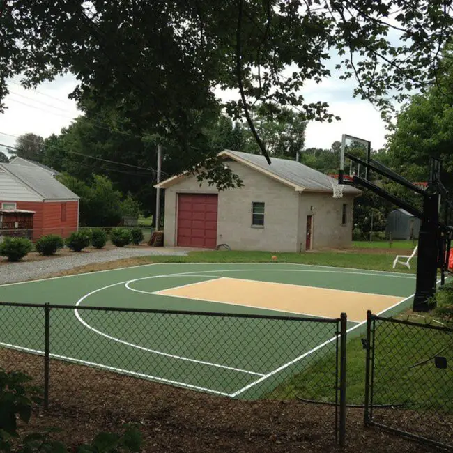 Eco-Inspired Green and Beige Court Accented by a Rustic Shed