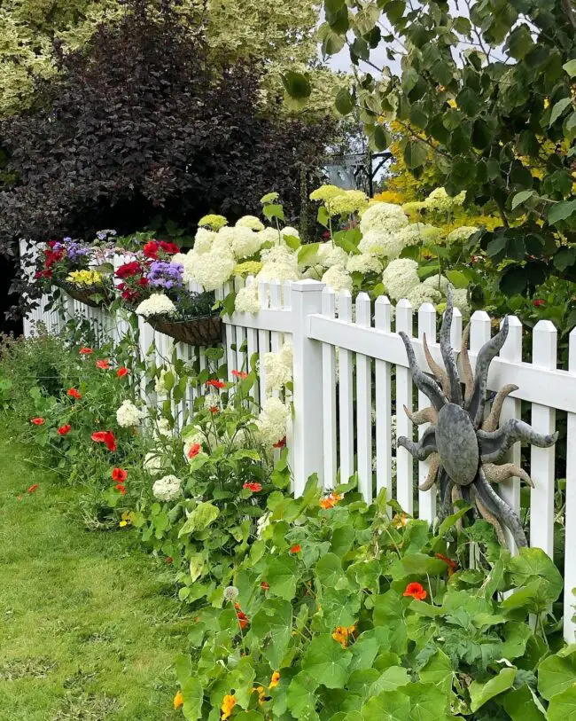 Charming White Picket Fence with Flowers