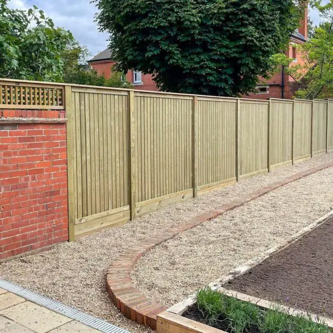 Timeless Wooden Fence with Brick Foundation