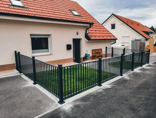 Chic Black Fence Enhancing Modern Spaces