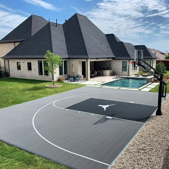 Luxury Backyard Court Featuring a Pool