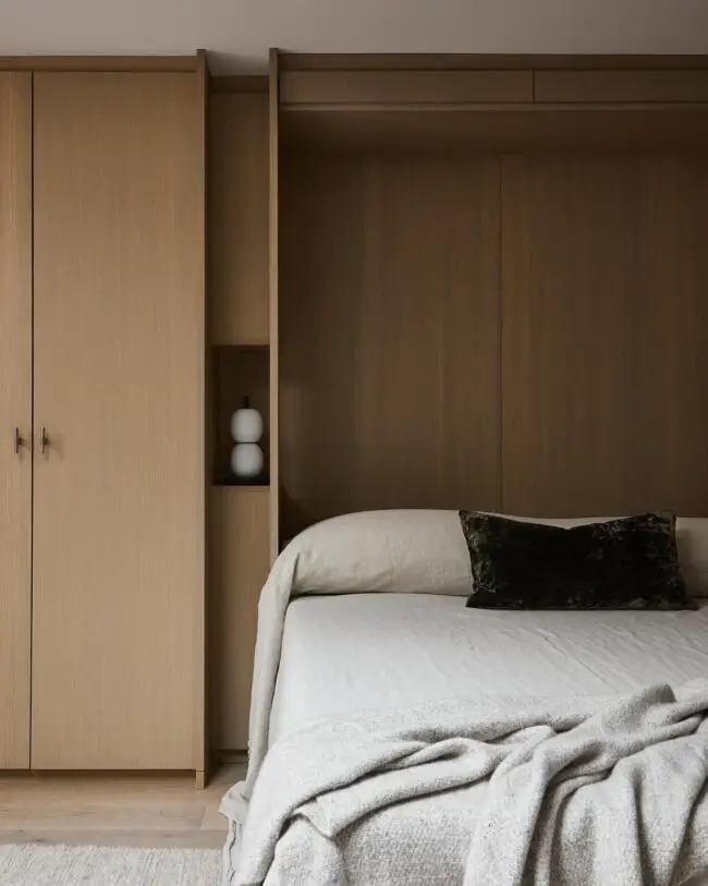 Inviting Wood Murphy Bed for a Warm Bedroom Atmosphere